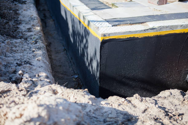 Professional Waterproofing technician working in Dunlap, IN